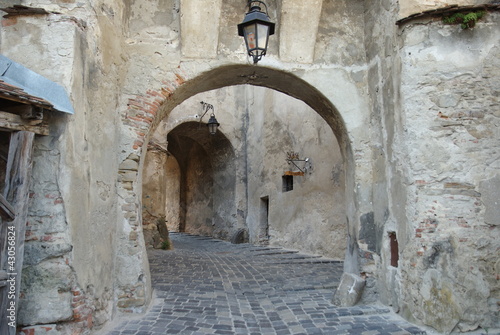 Sighisoara, walk under the arches photo