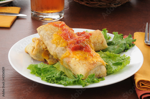 Plate of chimichangas with cheese