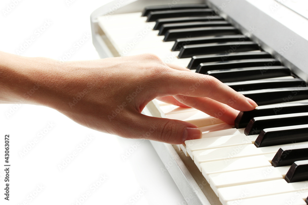 hand of woman playing synthesizer hand of woman playing synthesizer