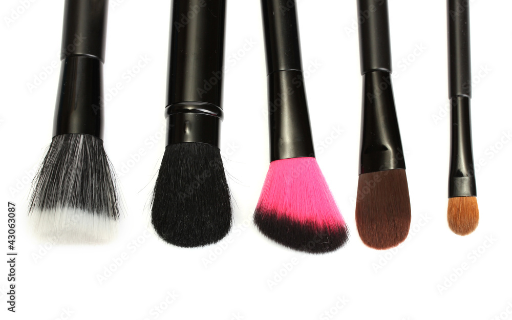 Fototapeta premium black brushes for make-up isolated on white.