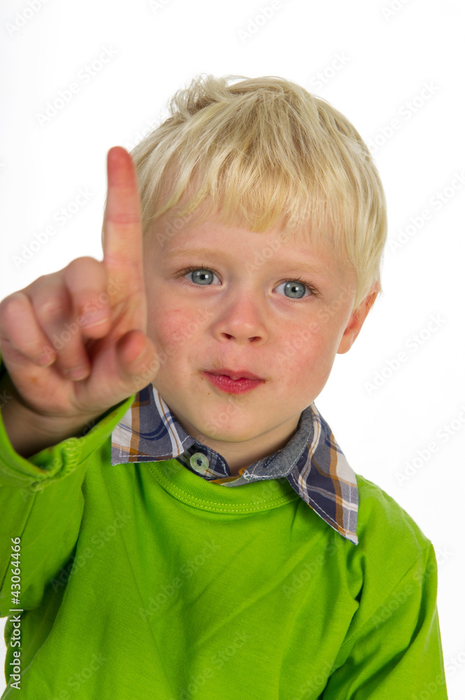 Little boy making watching out sign Little boy making watching out sign