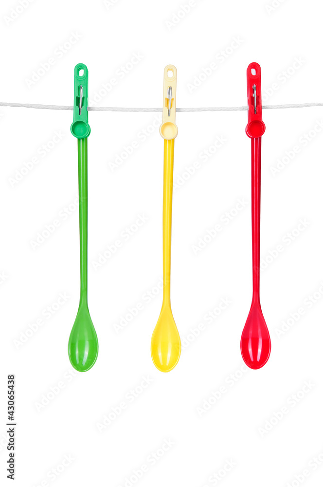 three spoons  on a rope