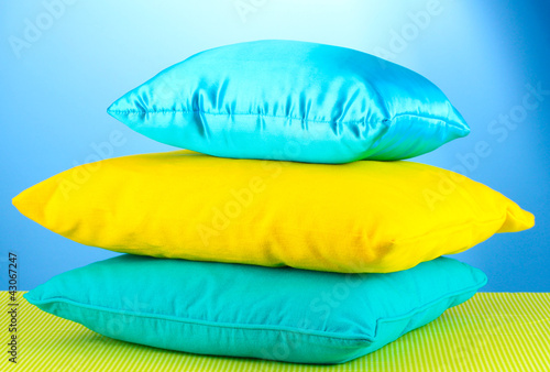 pillows on blue background