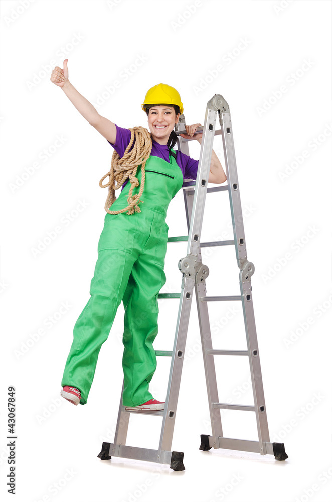 Woman worker standing on ladder Woman worker standing on ladder