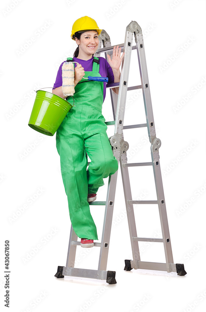 Woman worker standing on ladder Woman worker standing on ladder