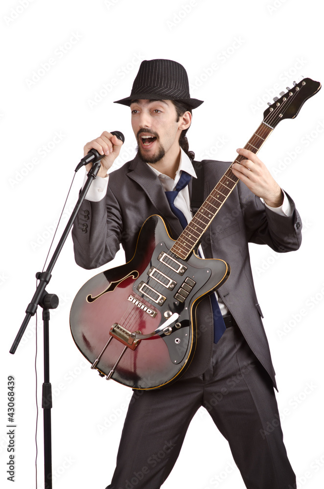 Fototapeta premium Businessman playing the guitar on white