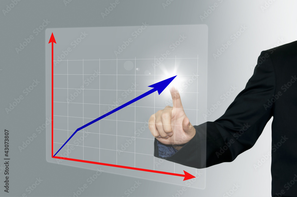 Business man pointing a growing graph on the screen background Business man pointing a growing graph on the screen background