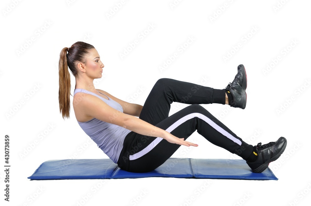 Fototapeta premium Fit young female pilates instructor showing different exercises