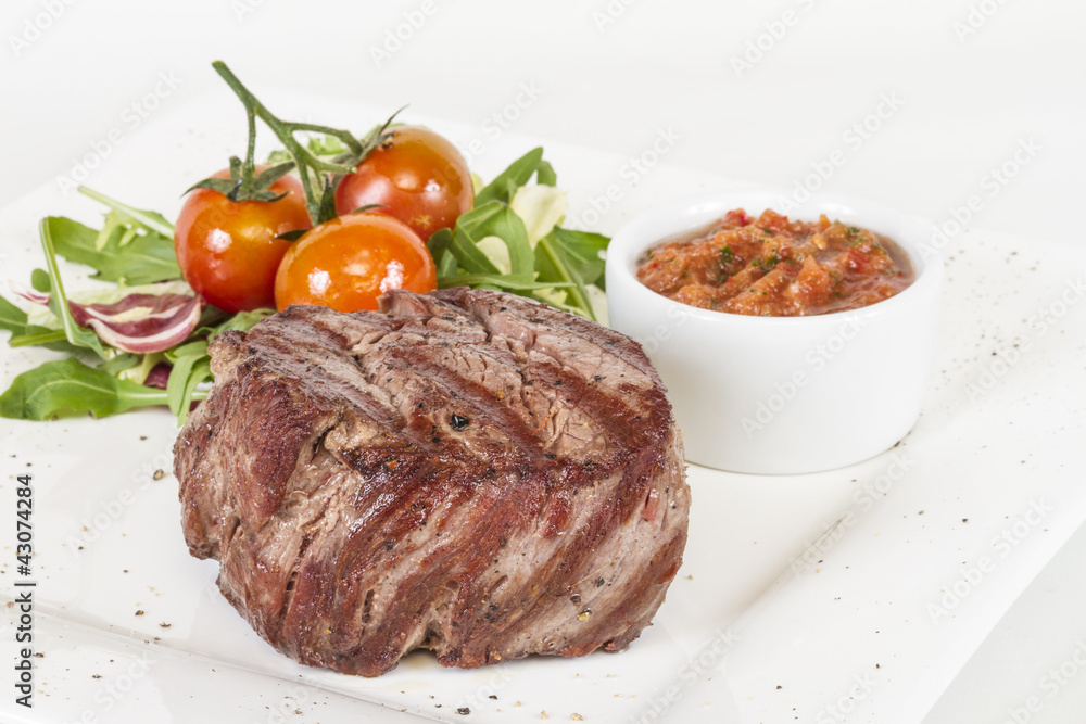 Grilled Beef Steak Isolated On a White Background Grilled Beef Steak Isolated On a White Background