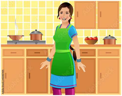 Beautiful Indian woman in kitchen