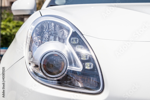 Head lights of a white car © Wead