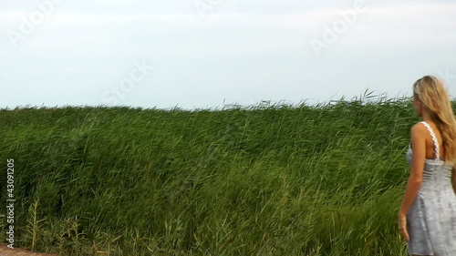 pretty woman walking  reed