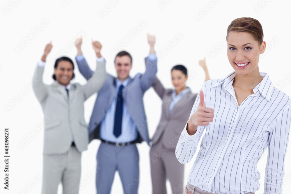 Close-up of a woman smiling and approving with enthusiastic busi Close-up of a woman smiling and approving with enthusiastic busi