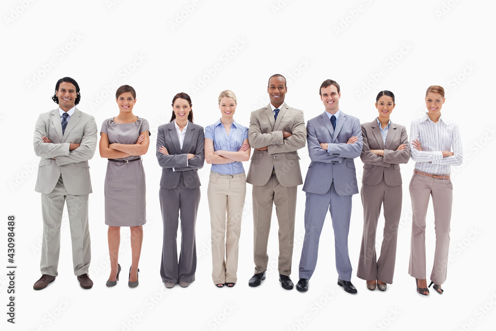 Smiling business team crossing their arms side by side Smiling business team crossing their arms side by side