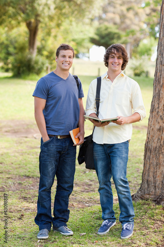 Portrait of two smiling male students posing © WavebreakmediaMicro