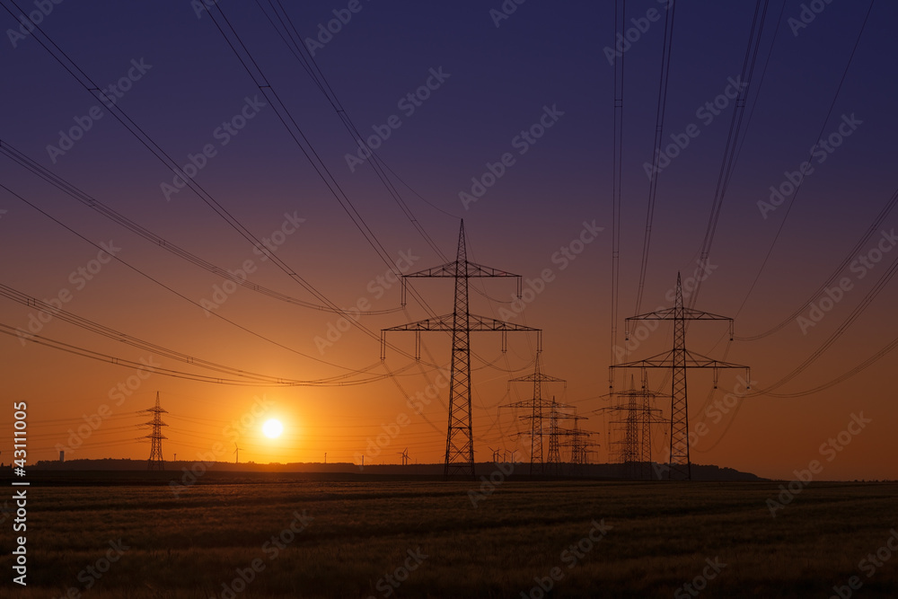 Sunset with Power Lines and a group of Power Towers