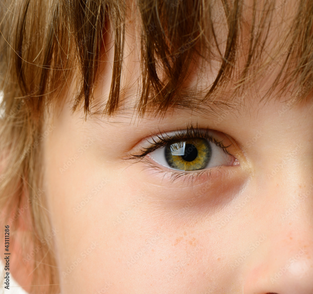 Naklejka premium Children eye closeup