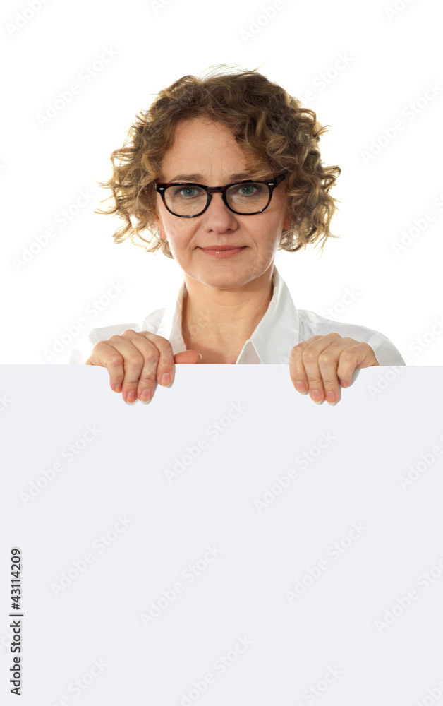 Aged woman behind big blank white banner ad Aged woman behind big blank white banner ad