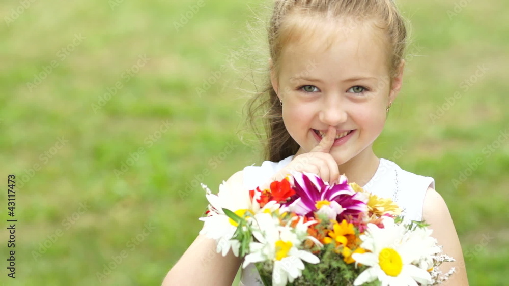 Portrait of a girl with a secret and bouquet of flowers Portrait of a girl with a secret and bouquet of flowers