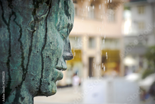 Crying fountain with termal water in Karlovy Vary photo