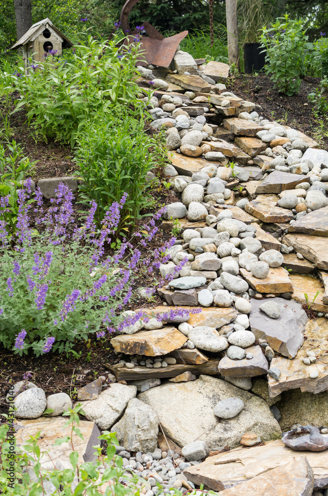 Garden water course with rocks