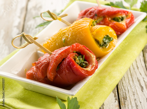 Fotografering capsicum stuffed with parsley capers and anchovies
