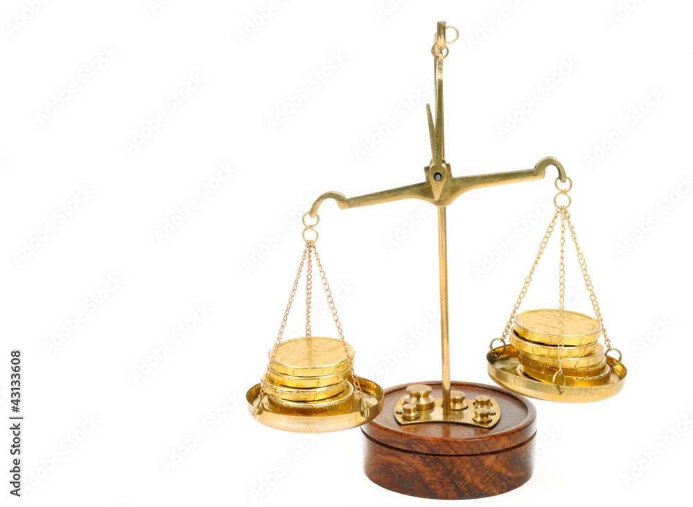 Scale and golden coins