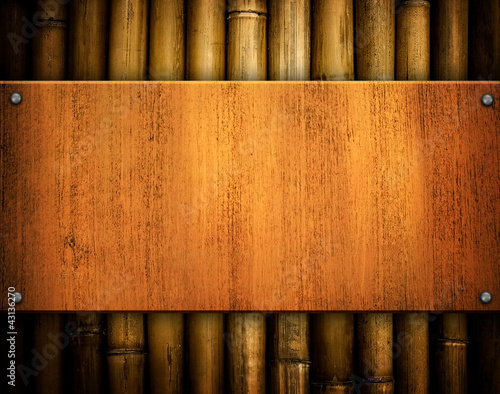 wood background with bamboo frame