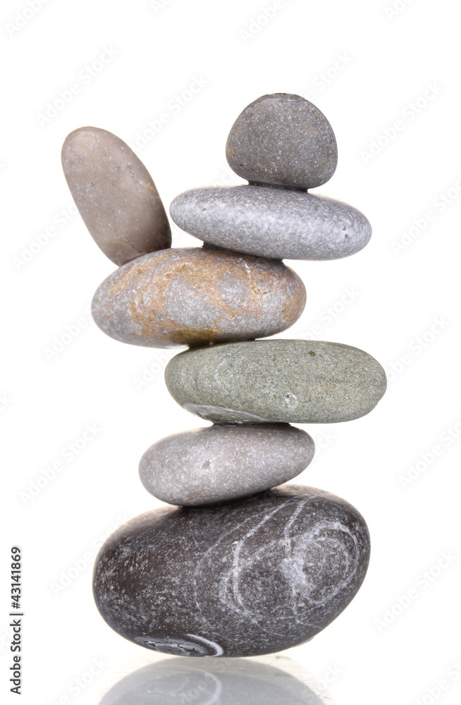 Stack of balanced stones isolated on white Stack of balanced stones isolated on white