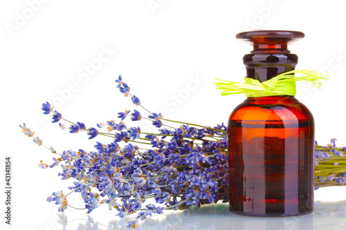 Fototapeta Naklejka Na Ścianę i Meble -  Lavender flowers and glass bottle isolated on white
