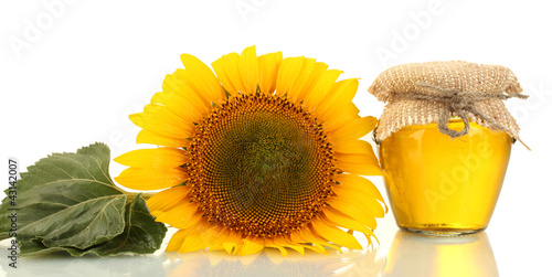 Obraz na plátně sunflower oil and sunflower isolated on white