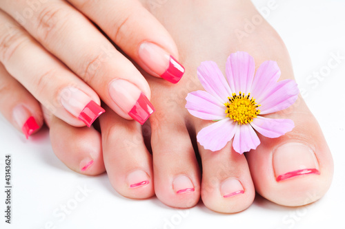 manicure and pedicure relaxing with flowers