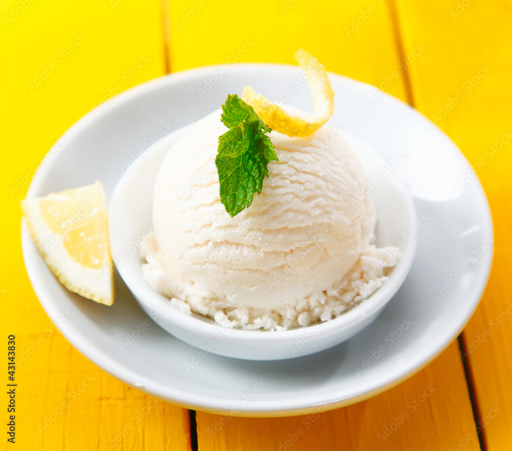 Tangy lemon sorbet served with zest Tangy lemon sorbet served with zest
