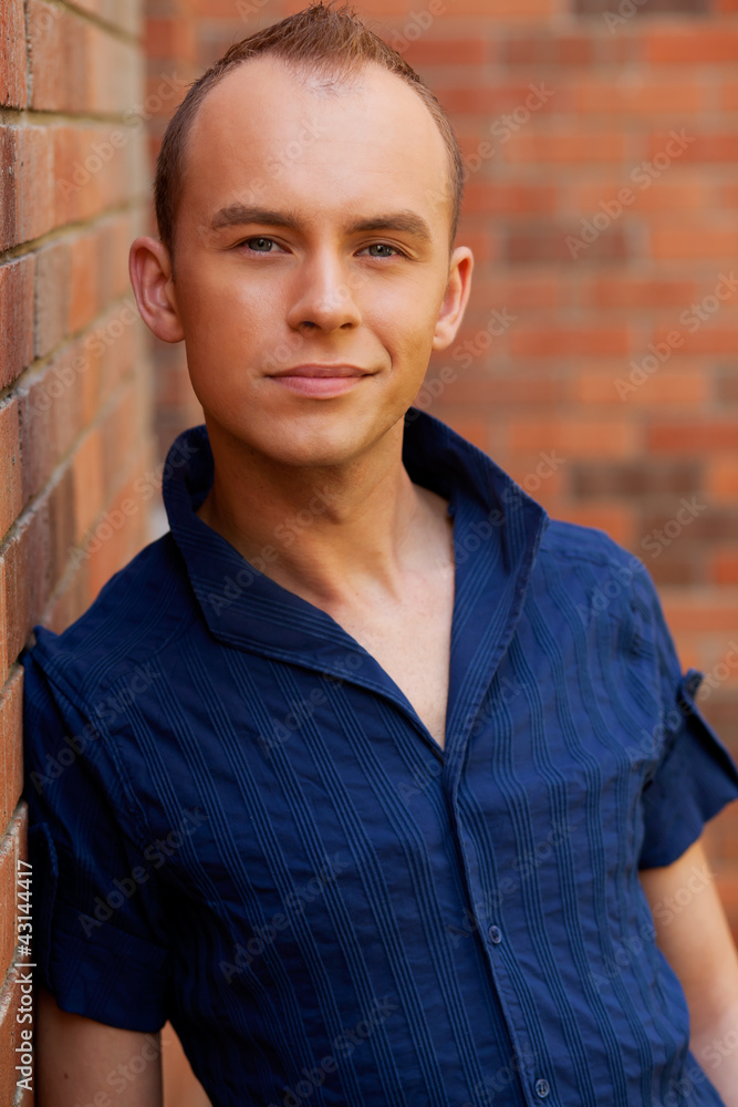 portrait of a young smiling nice man portrait of a young smiling nice man