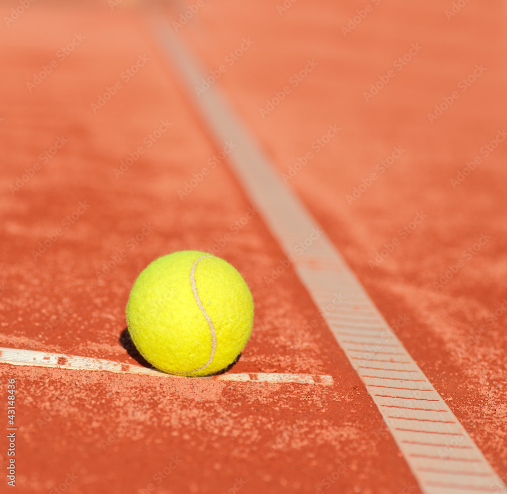 tennis ball near the out line