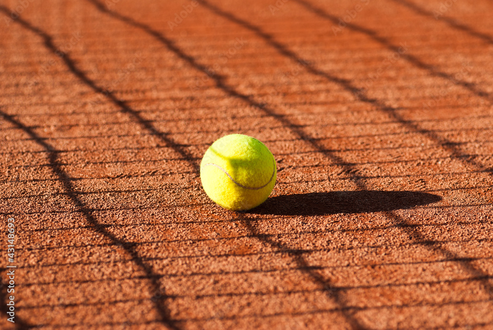 tennis ball and net shadow pattern