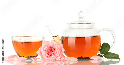 teapot and cup of tea with rose isolated on white