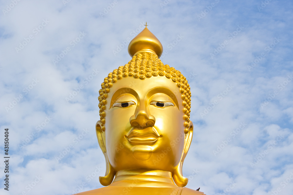 Head golden Buddha statue in a Buddhist temple