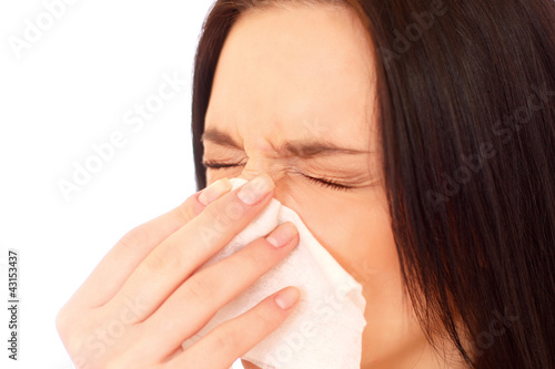 A sneezing woman