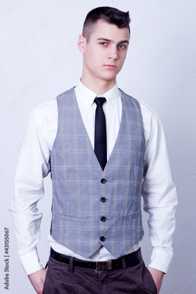 attractive business man in gray waistcoat attractive business man in gray waistcoat