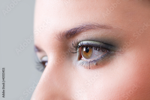 closeup female eye with makeup