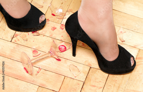 women shoes walking on broken glass photo