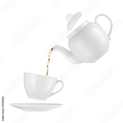 Tableau sur toile Teapot pouring tea into a cup on a white background