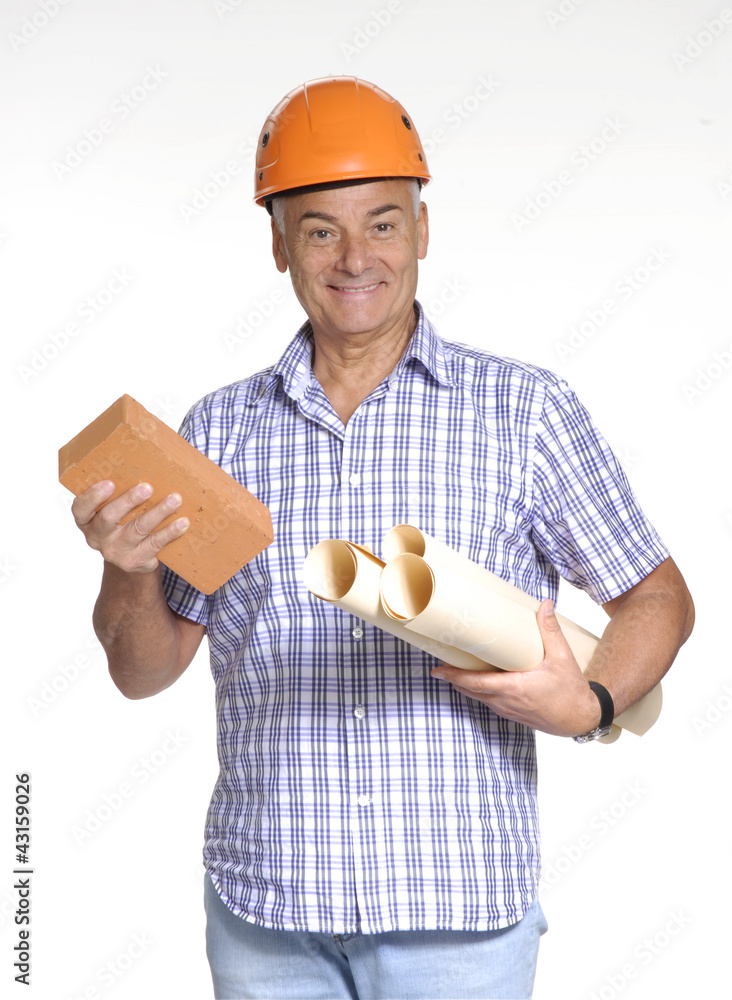Señor arquitecto sujetando planos de construcción y ladrillo. Señor arquitecto sujetando planos de construcción y ladrillo.