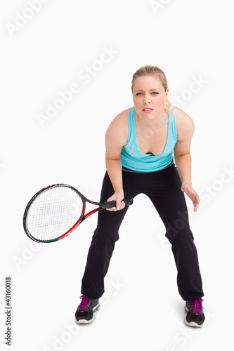 Concentrated woman waiting a tennis ball © WavebreakmediaMicro