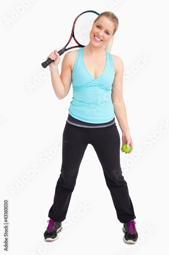 Woman having a ball and tennis racquet © WavebreakmediaMicro