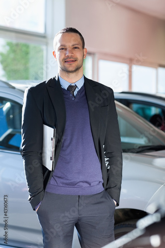 Wallpaper Mural Man standing beside a car Torontodigital.ca