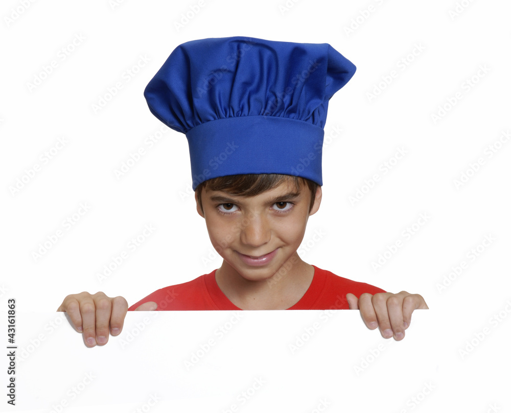 Niño cocinero sujetando un panel blanco,niño chef. Niño cocinero sujetando un panel blanco,niño chef.