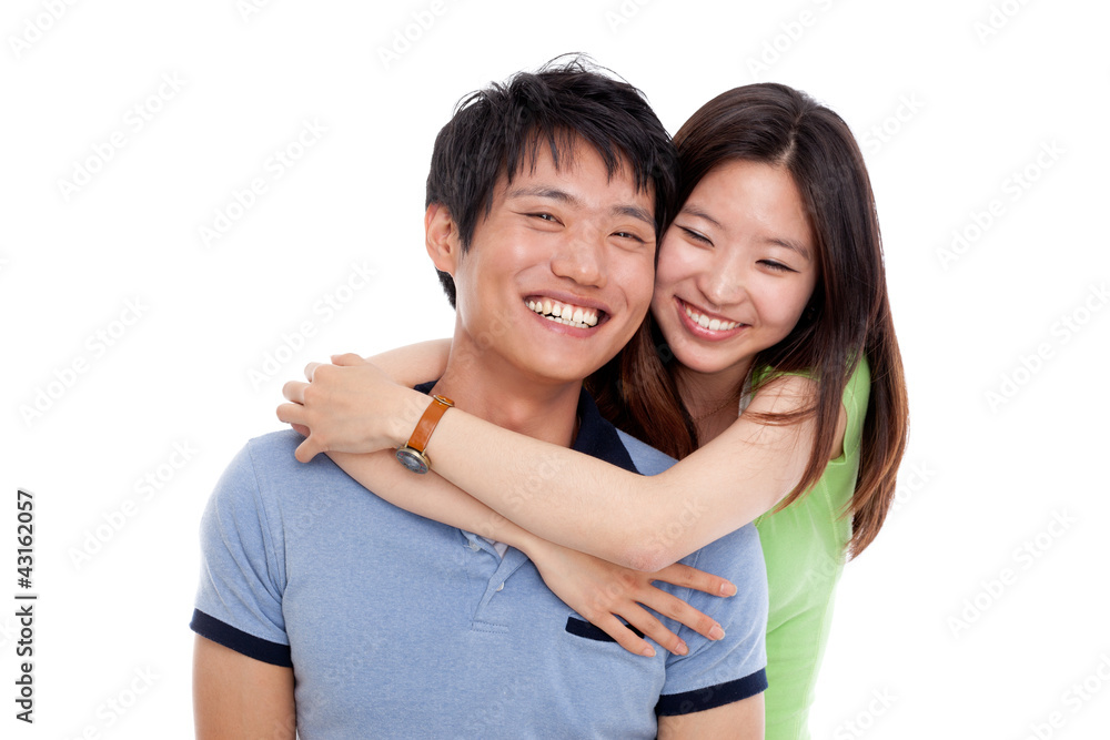 Happy young Asian couple isolated on white background. Happy young Asian couple isolated on white background.