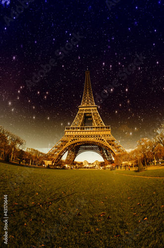 Canvas Print Stars and Night Sky above Eiffel Tower in Paris